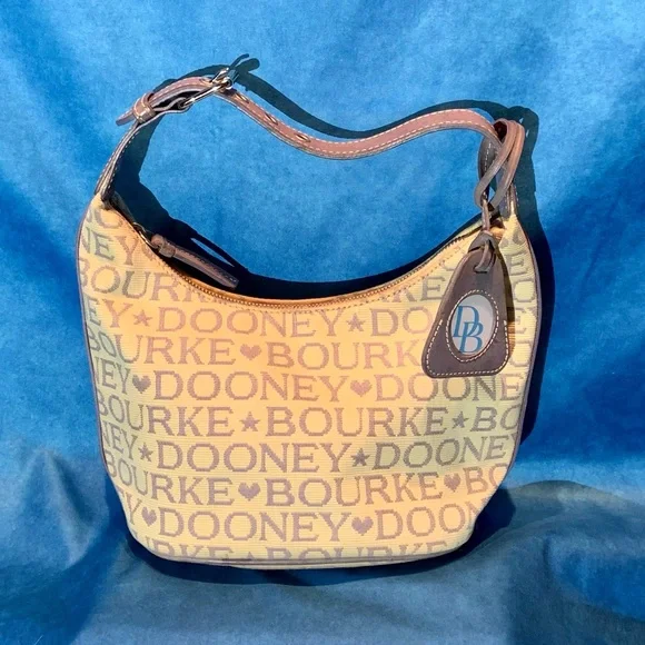 Dooney & Bourke Cream & Lilac Bucket Bag - Picture 2 of 16